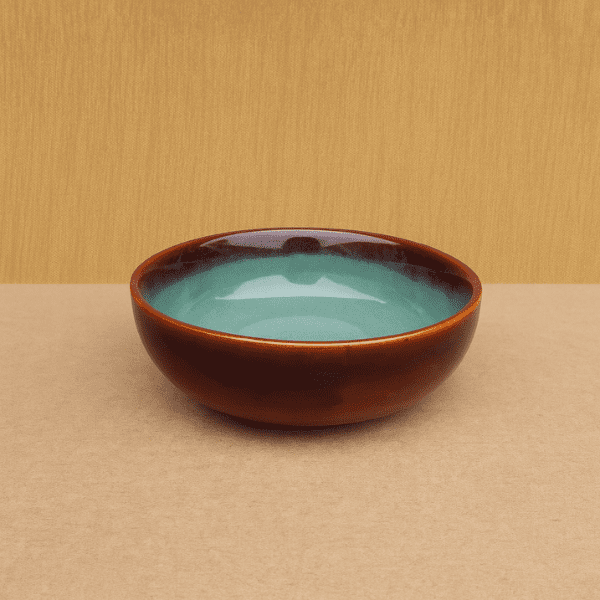 Two-Tone Glazed Ceramic Bowl – Teal Interior & Burnt Amber Exterior
